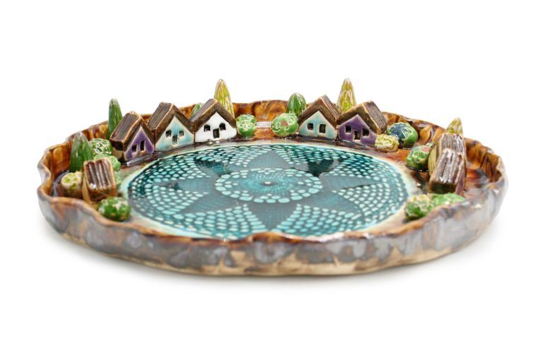 Decorative ceramic platter with houses