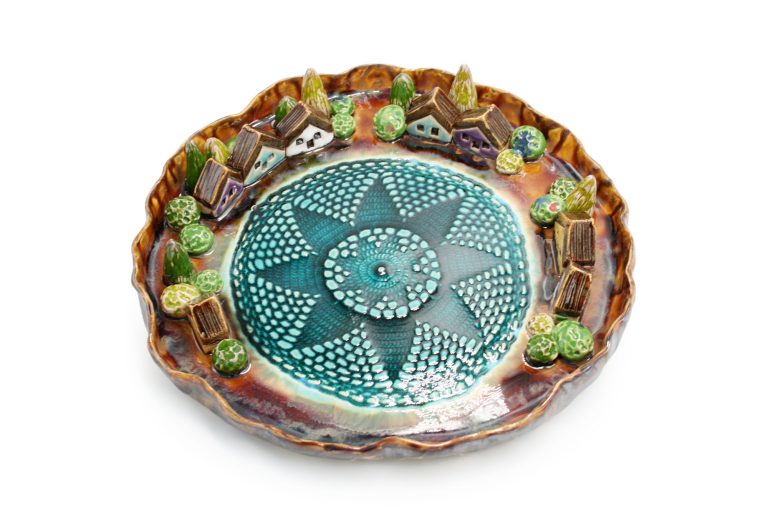Decorative ceramic platter with houses