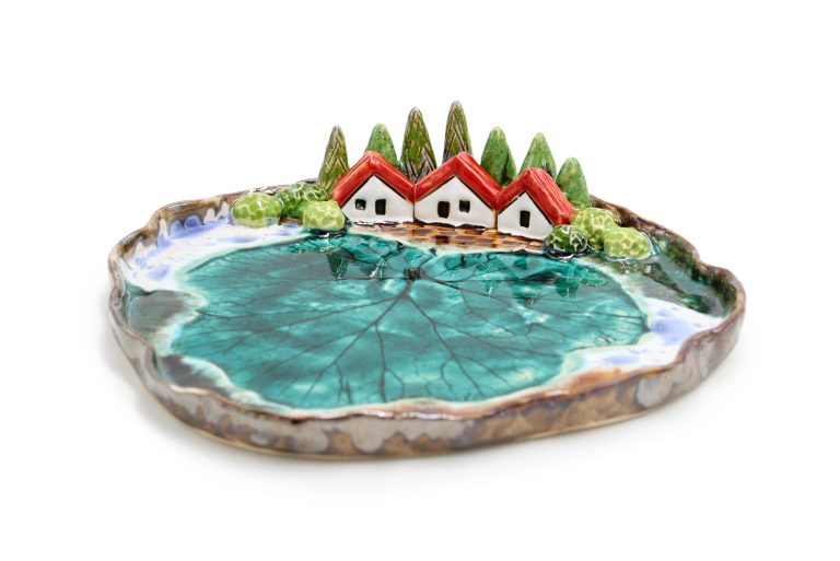 Unique platter with three houses